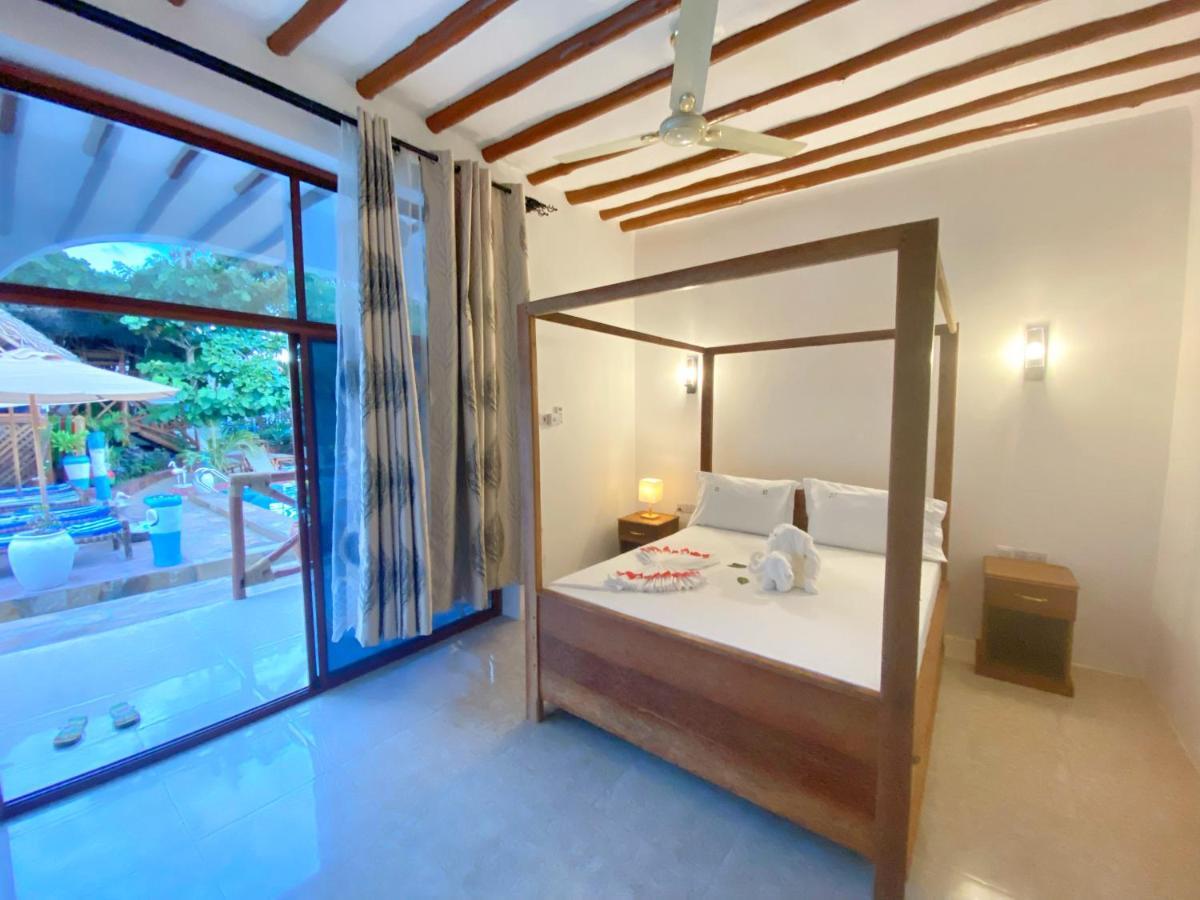 Utulivu Bungalow Nungwi Bagian luar foto